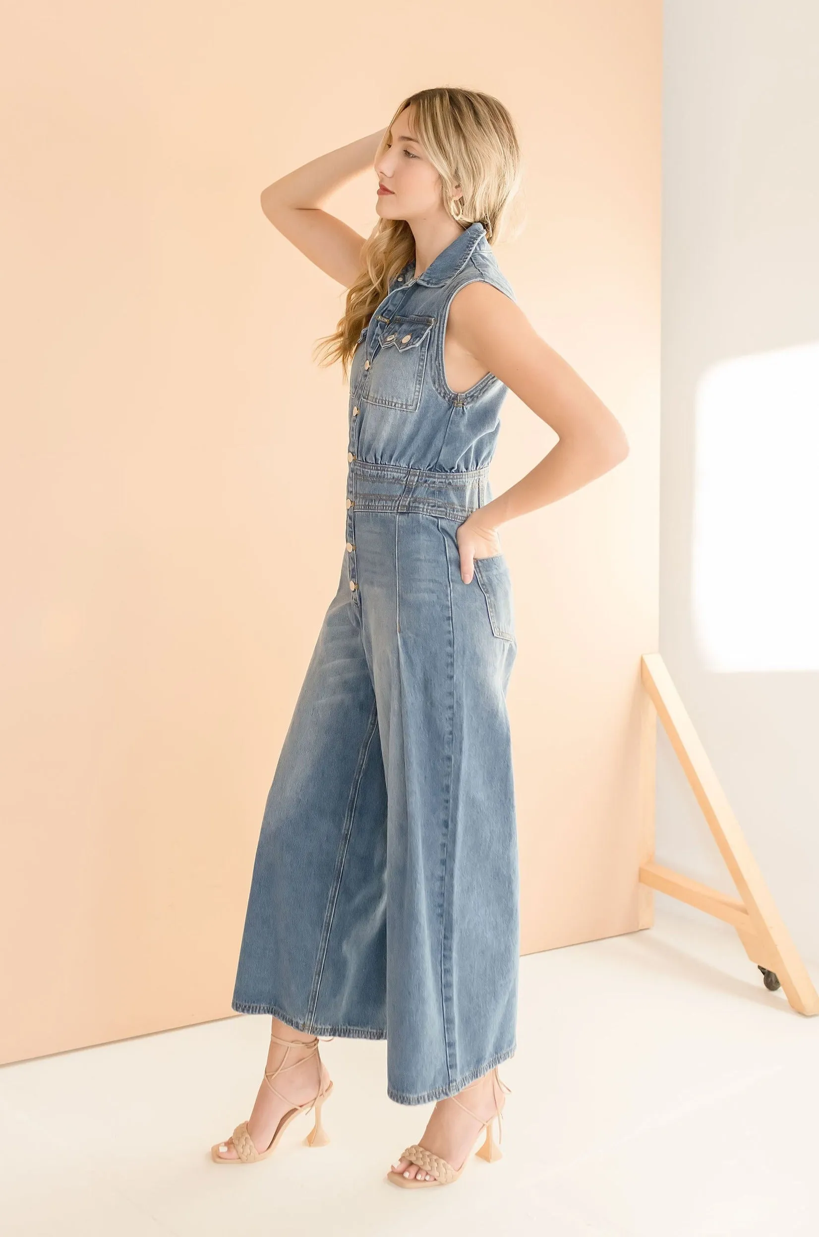 Becca Sleeveless Button Down Denim Jumpsuit Medium Wash