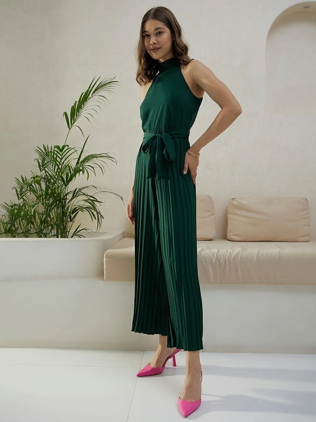 Berrylush Women Solid Green Halter Neck Sleeveless Waist Tie-Up Pleated Culotte Jumpsuit