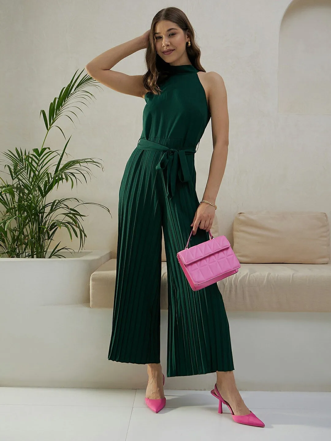 Berrylush Women Solid Green Halter Neck Sleeveless Waist Tie-Up Pleated Culotte Jumpsuit