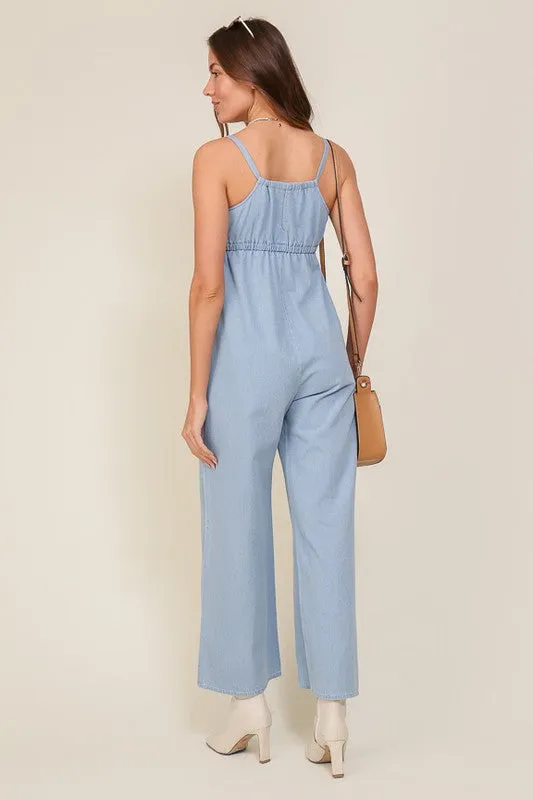 DENIM BLUE SLEEVELESS JUMPSUIT WITH SELF FRONT TIE